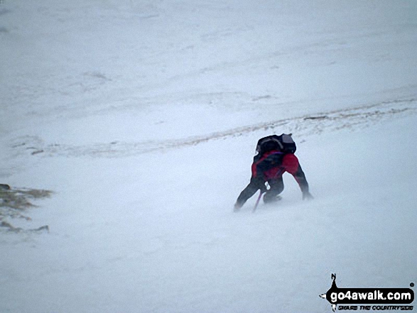 Walk c314 Whernside from Dent - Mike (go4awalk.com editor) practising his crampons and ice-axe technique in the snow on Whernside