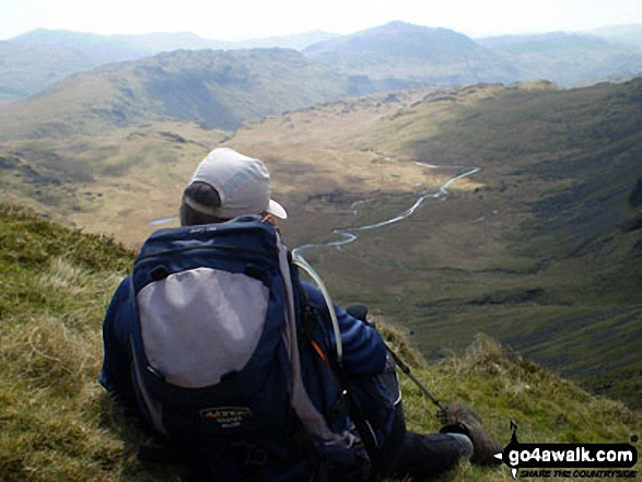 Harter Fell (Eskdale) and Eskdale from the summit of Pen (Eskdale) . . . with Mike, the go4awalk editor in the foreground!