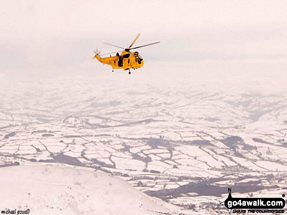 Walk po127 Fan y Big, Cribyn, Pen y Fan and Corn Du from Neuadd Reservoir - Mountain Rescue helicopter above Pen y Fan in the snow