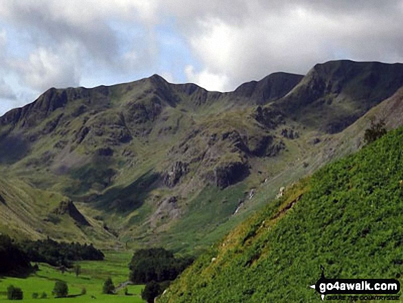 Walk c220 Helvellyn via Striding Edge from Glenridding - The head of the Grisedale Valley with Dollywaggon Pike to the left, High Crag, Nethermost Pike and then Helvellyn (far right) from near Brownend Plantation