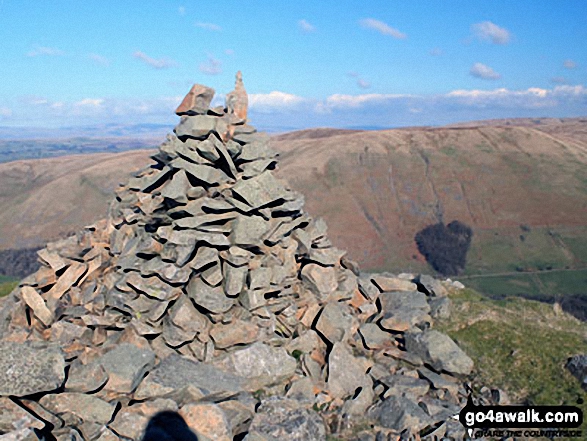 Grayrigg Pike (Grayrigg Forest) summit cairn with Blease Fell in the background