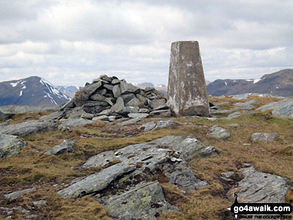 Trig point and cairn on the summit of Beinn Cheathaich 