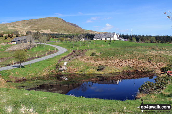 The buildings at Soms Knowe with Moorbrock Hill beyond 