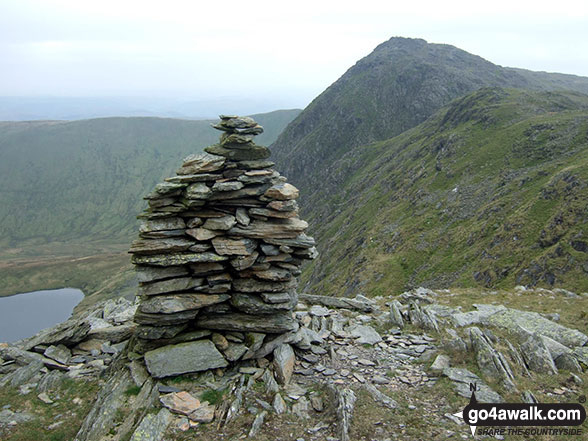 Summit cairn on Erw y Ddafad-ddu with Aran Fawddwy beyond