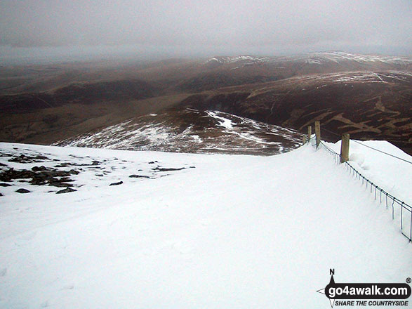 Walk c236 Skiddaw from Millbeck, nr Keswick - Descending towards Bakestall from a very cold and snowy Skiddaw