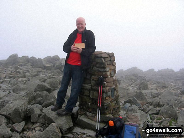 John Townsend and our dog Hamish's ashes at the top of Scafell Pike No view I'm afraid - Hamish always joined us peak-bagging before he died so we thought he should come along.