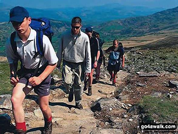 Walk gw186 Garnedd Ugain, Snowdon (Yr Wyddfa) & Moel Cynghorion from Llanberis - Friends climbing Snowdon