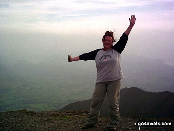 Walk c191 The Glendermackin Round from Mungrisdale - Celebrating at the top of Blencathra (or Saddleback) having successfully negotiated Sharp Edge