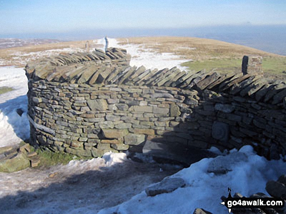 Walk ny331 The Yorkshire Three Peaks Challenge as a 3 day walk - Day 1 from Horton in Ribblesdale (New 2013 Route) - Pen-y-ghent summit wind shelters in a little bit of snow