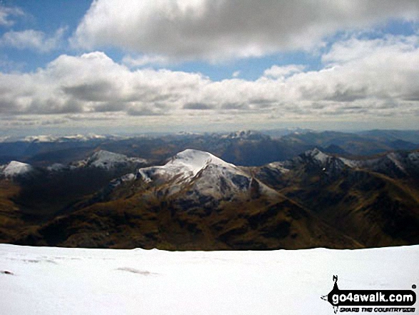 Walk h137 Ben Nevis and Carn Mor Dearg from Achintee, Fort William - The glorious view south to The Mammores from the top of Ben Nevis - with the snow topped Stob Chiore a' Mhail prominent in the middle of the picture