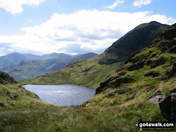 Walk c225 The Langdale Pikes via Jack's Rake from The New Dungeon Ghyll, Great Langdale - Stickle Tarn and Harrison Stickle from Easy Gully in the Langdale Pikes