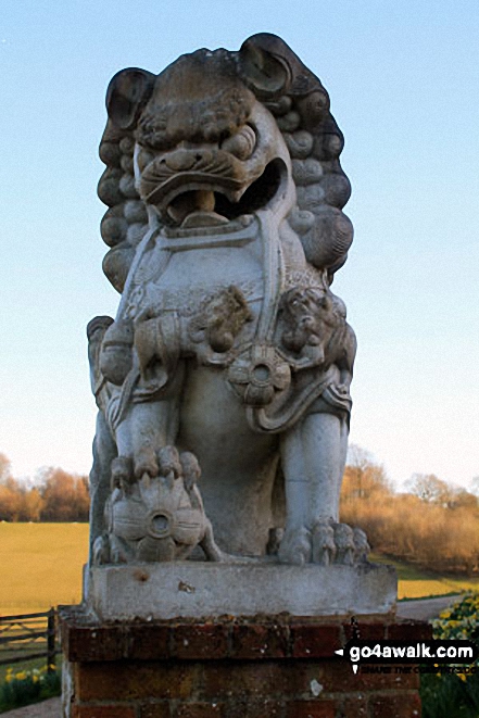 Gargoyle decorating the gates to Upper Woodside Farm 