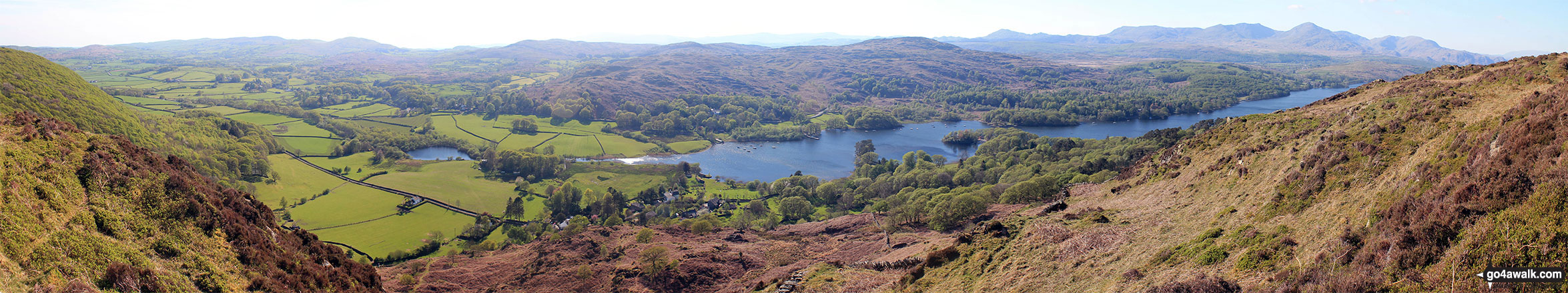 Coniston Water from the summit of Brock Barrow (Top o' Selside) with Beacon (Blawith Fells) prominent (centre) and the Coniston Fells: White Maiden, Walna Scar, Dow Crag, The Old Man of Coniston, Brim Fell, Swirl How and Wetherlam in the background (right)