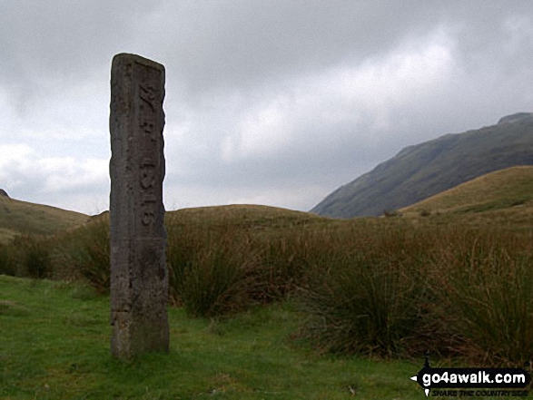 The Three Shire Stone on Wrynose Pass 