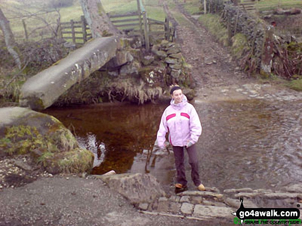 The bronze age bridge across the Colne Water at Wycoller on The Pendle Way. 