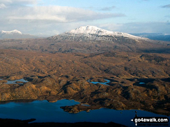 Snow on Canisp with Loch Veyatie in the foreground from the summit of Cul Mor