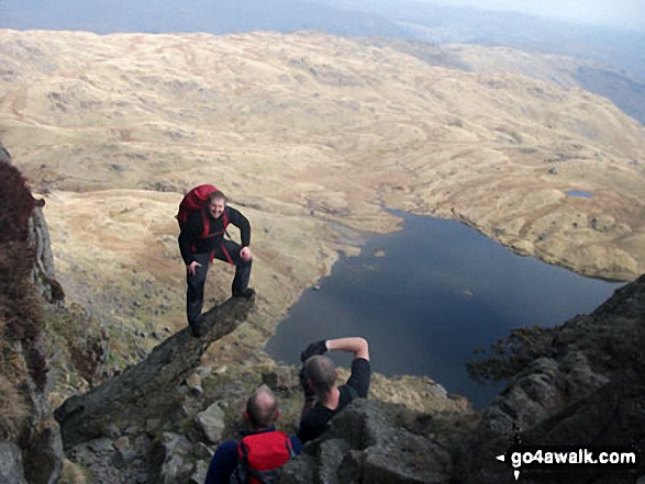 My son Stuart and friends on Jack's Rake, Pavey Ark with Stickle Tarn far below