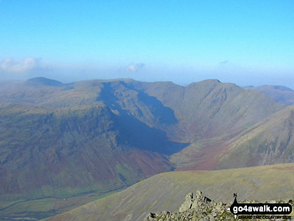 Walk c416 Scafell Pike from The Old Dungeon Ghyll, Great Langdale - The Mosedale Horseshoe - Yewbarrow (mid-distance left), Red Pike (Wasdale) and Little Scoat Fell beyond, Pillar (right of centre) and the shoulder of Kirk Fell (mid-distance right) from Scafell Pike