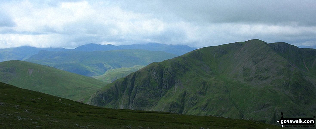 Walk c181 Dollywaggon Pike and Seat Sandal from Patterdale - Dollywaggon Pike (right) with The Langdale Pikes (mid distance) and Bow Fell (Bowfell) and
Scafell Pike (far distance) from St Sunday Crag