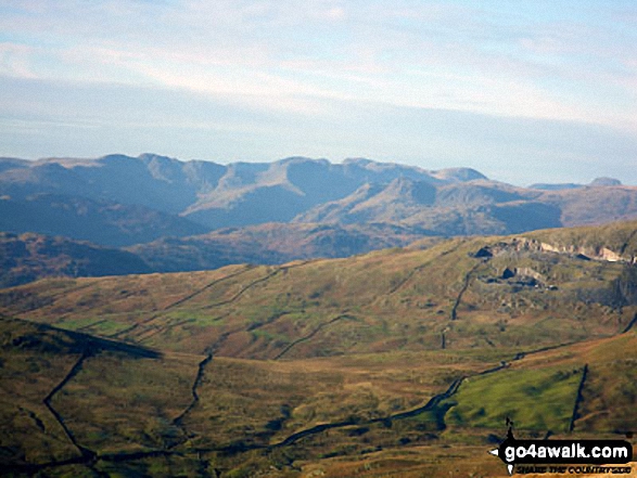 Walk c153 Thornthwaite Crag from Troutbeck - Sca Fell, Scafell Pike and the dome of Great Gable in the distance beyond Crinkle Crags and Bow Fell (Bowfell) with The Langdale Pikes in the mid distance from Yoke