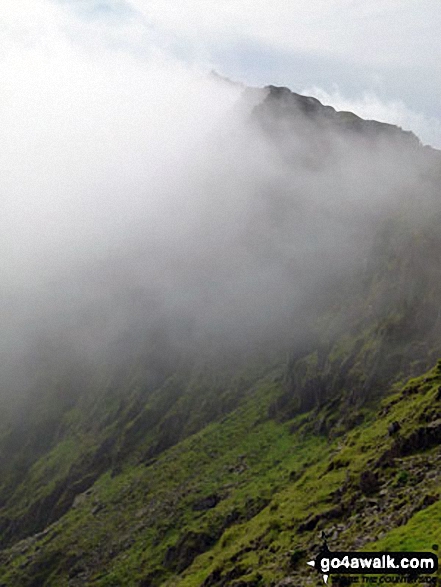 Walk gw186 Garnedd Ugain, Snowdon (Yr Wyddfa) & Moel Cynghorion from Llanberis - The summit of Snowdon in the clouds from the top of the PYG Track