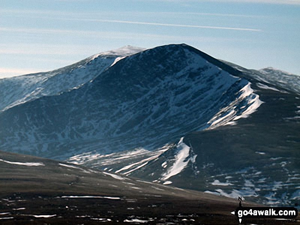 Walk c245 Blencathra from Mungrisdale - Blencathra (or Saddleback) (centre left distance) behind Atkinson Pike (centre right) with Sharp Edge prominent (mid left) from an unfamiliar viewpoint on Bowscale Fell