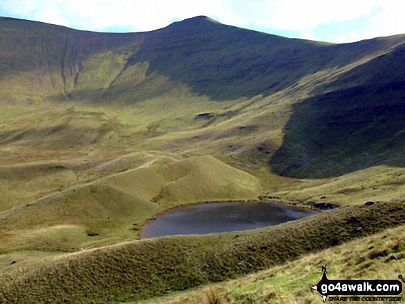 Walk po136 Corn Du and Pen y Fan from Nant Cwm Llwch near Brecon - Pen y Fan (far left) and Corn Du with Llyn Cwm Llwch tarn below from near the Tommy Jones Obelisk