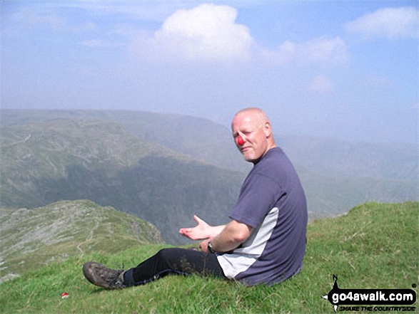 PK - The clown admiring the view on Harter Fell (Mardale) - looking over to High Street. in The Lake District Cumbria England