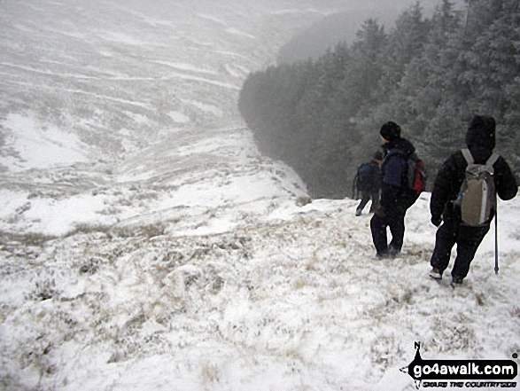 Descending in to the Grwyne Fawr Valley from Pen y Gadair Fawr in The Black Mountains I'm taking the picture of my husband Brian and my friends David and Chris.