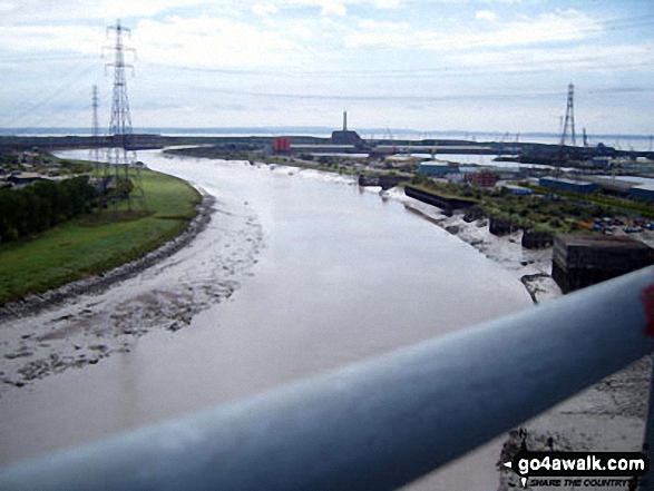 Looking south towards the Newport Wetlands from The Transporter Bridge across the River Usk (Afon Wsyg) in Newport 