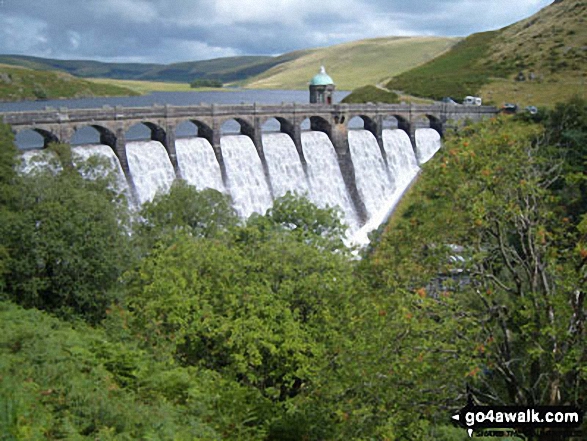 Water cascading down Caban-coch Reservoir Dam 