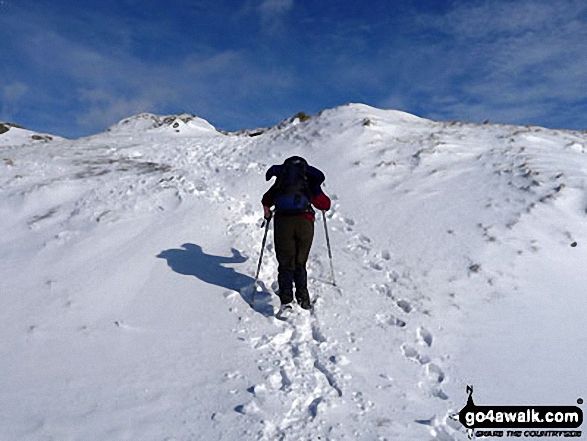 Walk c389 Great Rigg, Fairfield and Hart Crag from Ambleside - Me & my shadow approaching Great Rigg in the snow