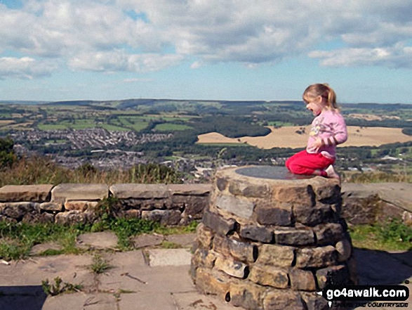 My daughter on top of The Chevin (Otley Chevin) 