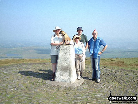 Graham, Oscar, Nina, Sean and Chuts on Pendle Hill in  Lancashire England