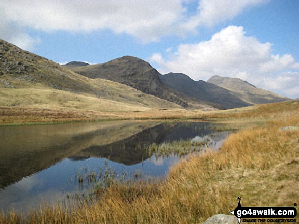 Walk c414 Crinkle Crags and Bow Fell (Bowfell) from The Old Dungeon Ghyll, Great Langdale - Red Tarn (Langdale) with Great Knott, Shelter Crags (Crinkle Crags) and Bow Fell (Bowfell) beyond