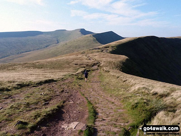 Walk po131 Bwlch y Ddwyallt and Fan y Big from Blaen y Glyn - Me striding out across Craig Cwmoergwm with Corn Du (centre - distance), Pen y Fan, Cribyn amd Fan y Big (far right).