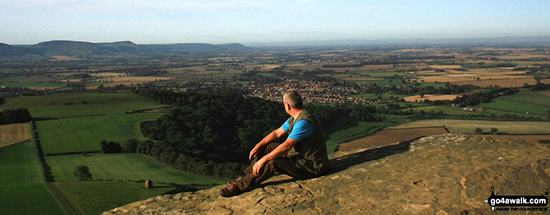 Me on top of Roseberry Topping with Great Ayton and The Cleveland Hills in the background