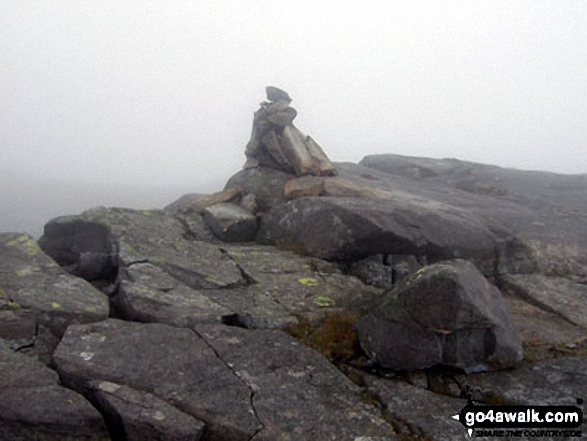 Foel Penolau summit cairn in mist 