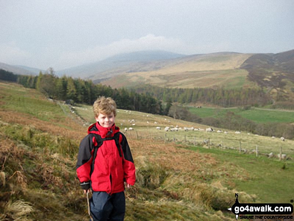 Walk n132 The Cheviot, Comb Fell and Hedgehope Hill from Harthope Burn Valley - James on Hedgehope Hill with The Cheviot in the background