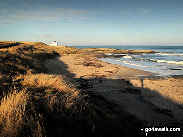 Walk n127 Budle Point from Bamburgh - Blackrocks Point, Bamburgh Lighthouse and Harkness Rocks from The Wynding