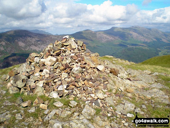 Walk c267 Haycock, Iron Crag, Lank Rigg and Grike from Ennerdale Water - Crag Fell summit cairn with Great Borne (left), Starling Dodd (centre), Red Pike (Buttermere) and High Stile in the distance