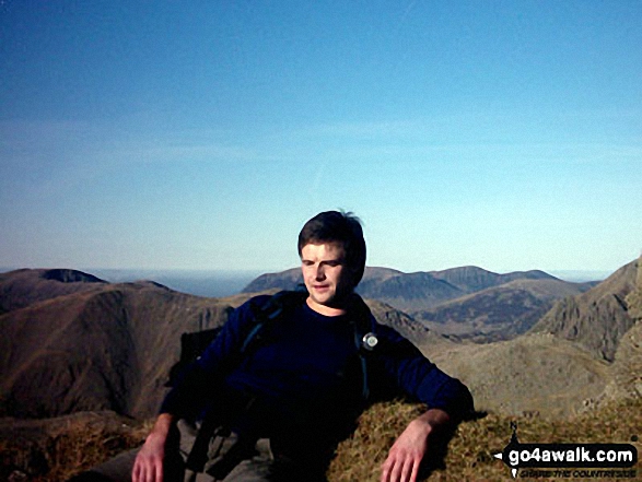 Walk c172 Scafell Pike via The Corridor Route from Wasdale Head, Wast Water - Relaxing on Scafell Pike summit