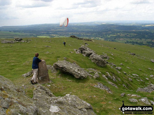 Waiting for a paraglider to take-off on Sourton Tors