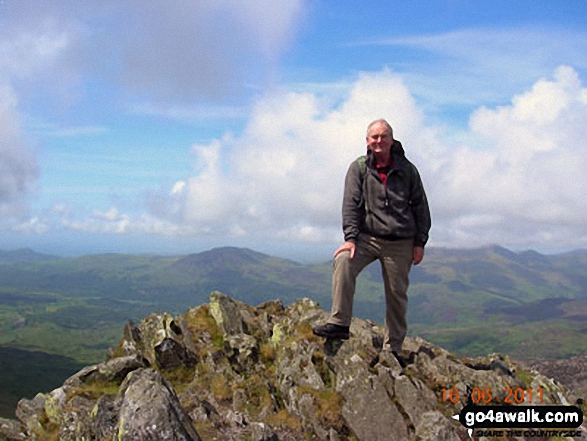 Walk gw163 Cnicht from Nantgwynant - Terry on the summit of Cnicht