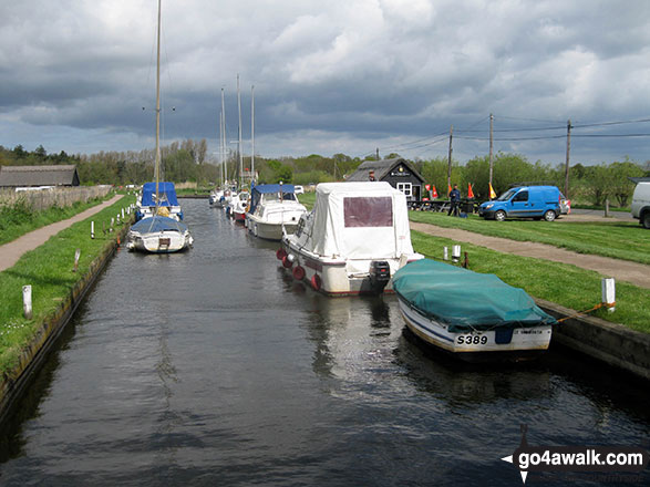 Walk nf145 Horsey from Winterton-on-Sea - Boats moored on Horsey New Cut near Horsey MillWindpump