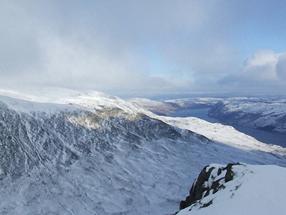 Looking back to Kidsty Howes and Haweswater from Rough Crag (Riggindale) summit in the snow