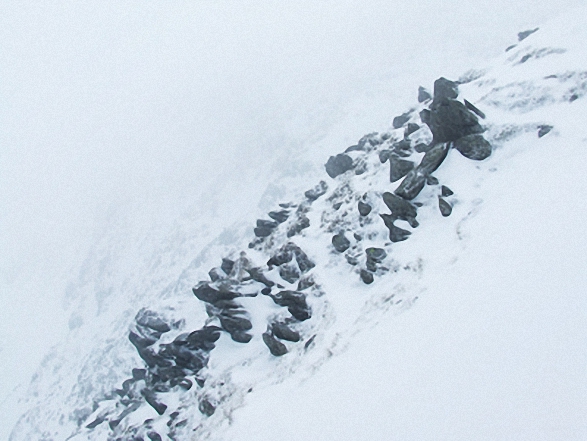 Walk c276 High Street and Harter Fell from Mardale Head - Riggindale Crags in the snow