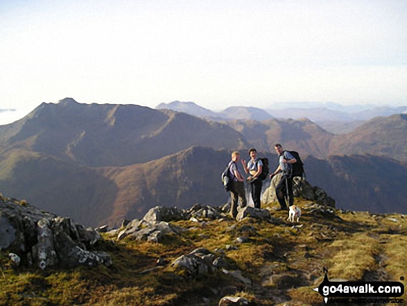 Me and my partner with our Jack Russell on Sgurr nan Saighead (Sgurr Fhuaran) 