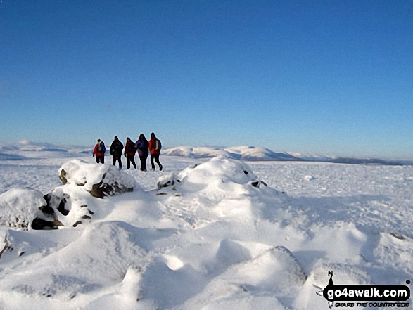 On a snowy Green Hill (Glen Clova) between Loch Wharral and Loch Brandy with Lochnagar in the distance 