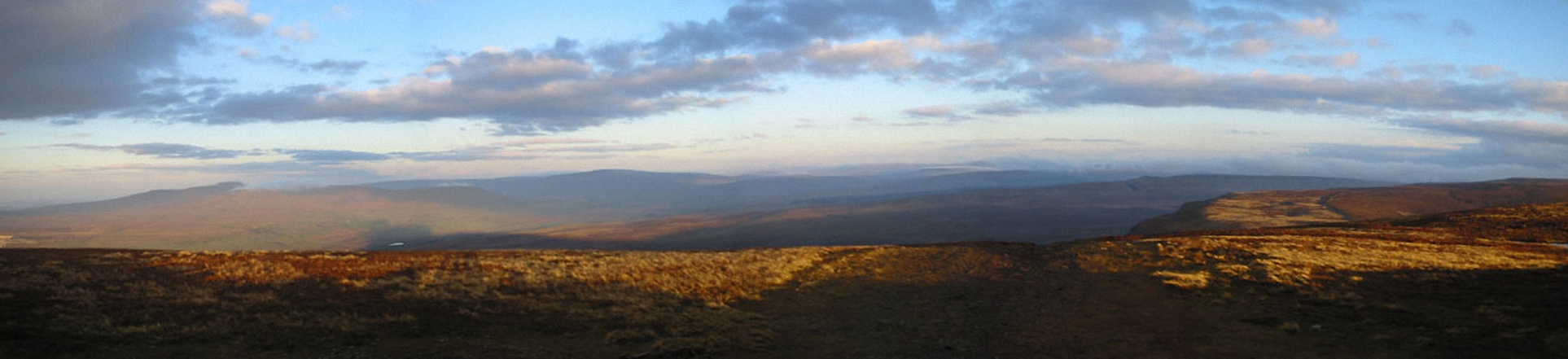 Ingleborough and Whernside from Pen-y-ghent in the early morning light